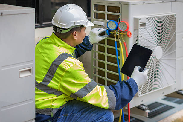 Professional Heat Pump Repair technician working in Kingsville, MD